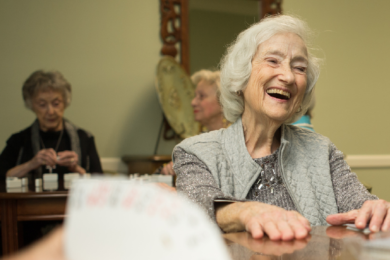 Independent Living residents enjoy game room activities with friends just down the hall.